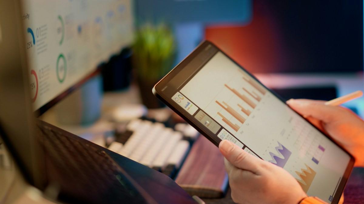 Finance data being reviewed on a tablet