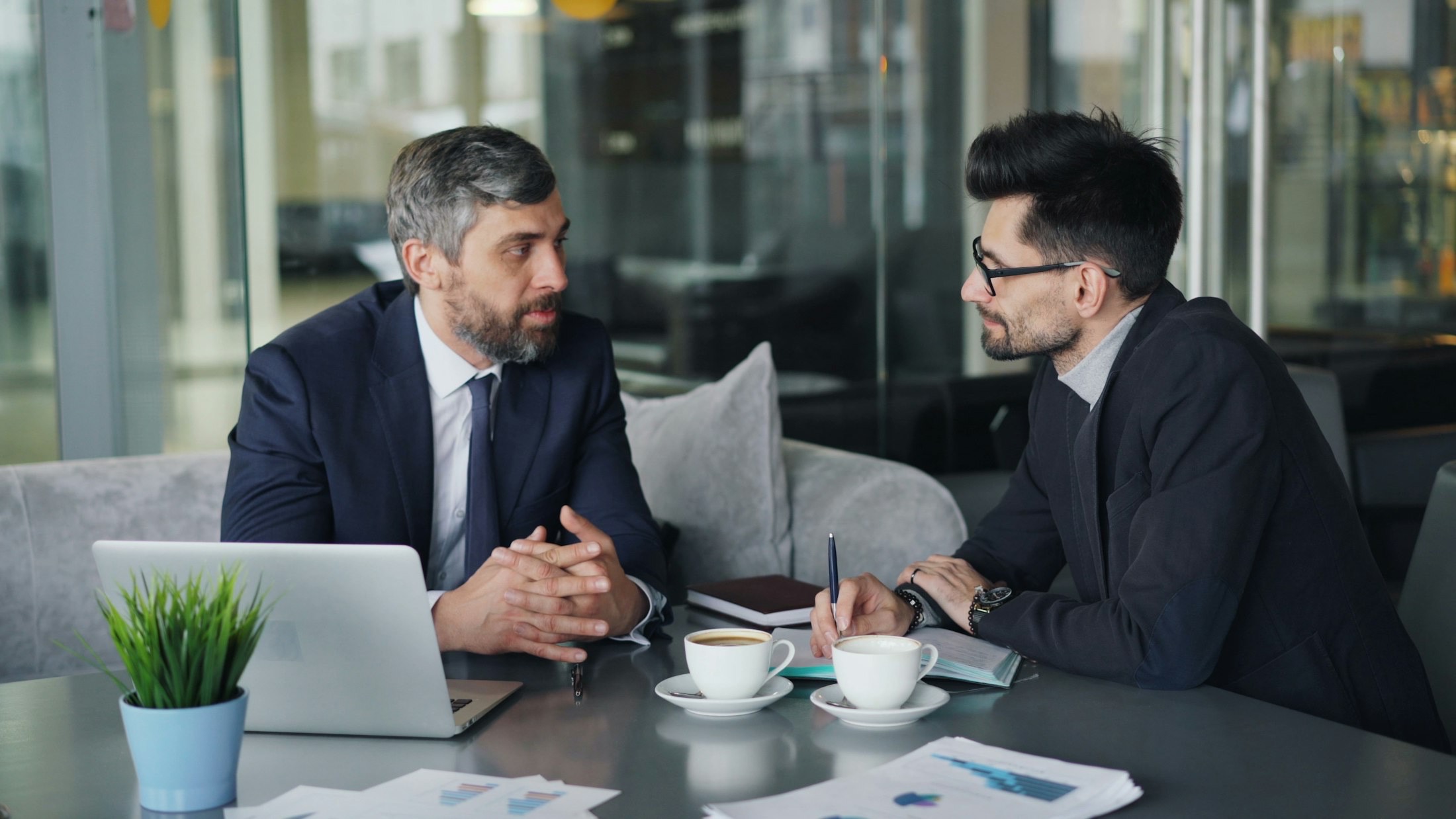 Two senior executives in a leadership meeting