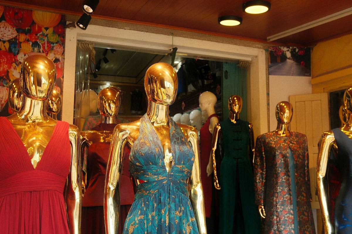 Golden mannequins in a luxury boutique